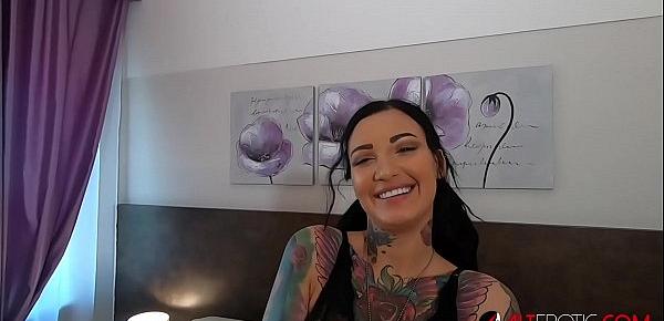 Busty tattooed Adel Asanti has her holes stretched wide
